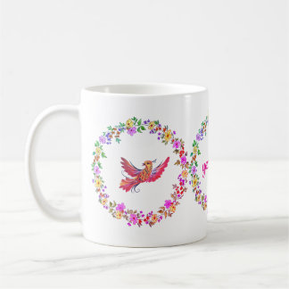 Floral wreath with bird coffee mug
