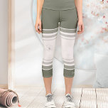 Floral Zen Athletic Stripes Ivory Sage Green Capri Leggings<br><div class="desc">Experience a deeper focus during your mindful movement with these ivory and sage green capri leggings from the Floral Zen Line Art Collection. Blending delicate botanical art on the knee and back waistband with bold athletic stripes, they offer a modern, serene aesthetic. These high-performance yoga pants feature a comfortable, flexible...</div>