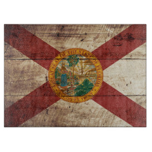 Florida State Flag on Old Wood Grain Cutting Board