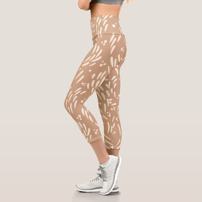 Flow in Tan and Cream Capri Leggings (Left)