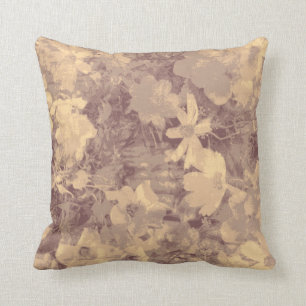 Flower and leaf camouflage pattern on beige cushion