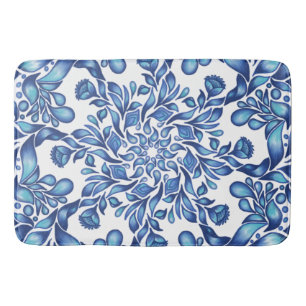 Flower and leaf mandala in blues bath mat