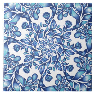 Flower and leaf mandala in blues ceramic tile