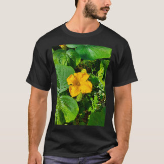Flower and leaves of a pumpkin growing in the vege T-Shirt