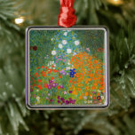Flower Garden | Gustav Klimt Metal Ornament<br><div class="desc">Flower Garden (1905-1907) by Austrian artist Gustav Klimt is a vibrant masterpiece of early 20th-century art. This lush, impressionistic scene bursts with colourful blossoms in a mesmerising tapestry of nature, reflecting Klimt’s decorative style and love for floral motifs. The painting’s rich textures and intricate details make it a timeless choice...</div>