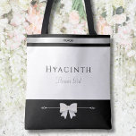 Flower Girl Gift | Minimalist Luxury Tote Bag<br><div class="desc">Even the smallest member of the bridal party deserves a "high-end" gift! This Flower Girl tote bag features the same elegant typography and silver accents as the adult versions, for a sweet yet sophisticated look. Perfect for holding petals, snacks, or activity books. The durable design and personalised name make it...</div>