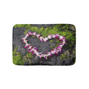 Flower Lei on the Rocks Bath Mat