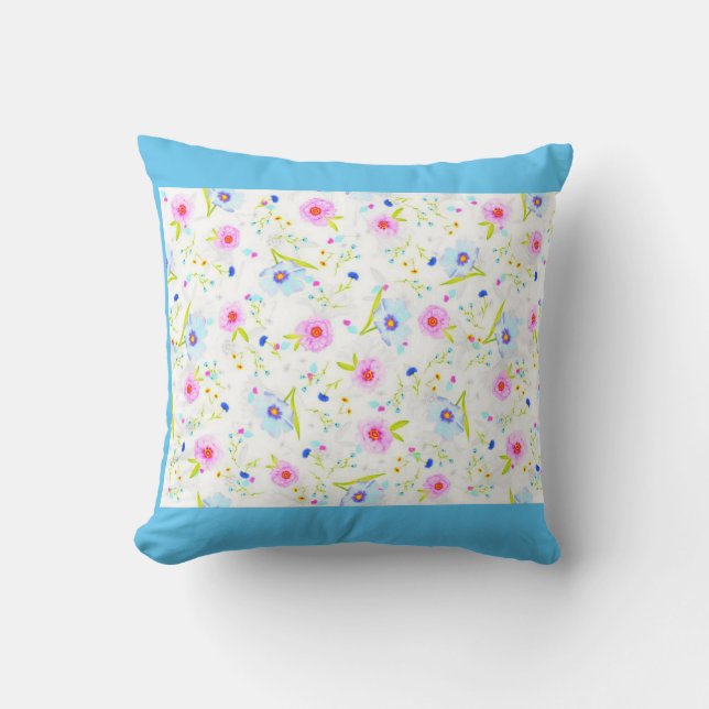 FLOWERED throw pillow in light blue. (Front)