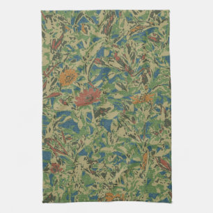 Flowers against leaf camouflage pattern tea towel