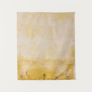 Flowers beside yellow wall tapestry