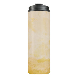 Flowers beside yellow wall thermal tumbler