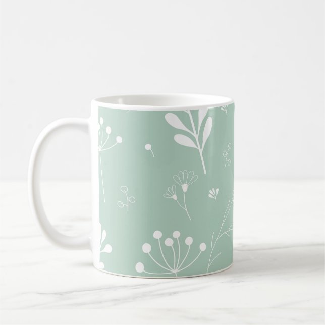 Flowers green background twigs coffee mug (Left)