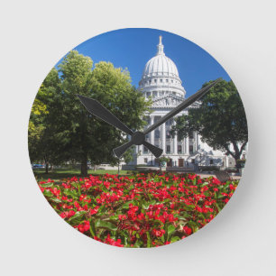 Flowers In Front Of State Capitol Building Round Clock