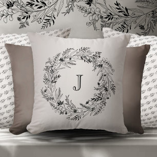 Flowing botanical wreath around letter J Cushion