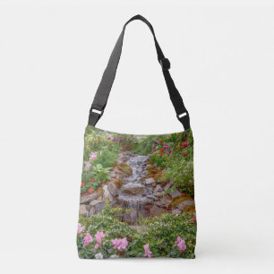 Flowing Waterfall with spring flowers Crossbody Bag