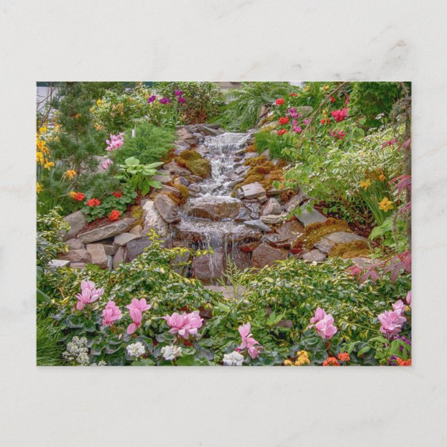 Flowing Waterfall with spring flowers Postcard (Front)