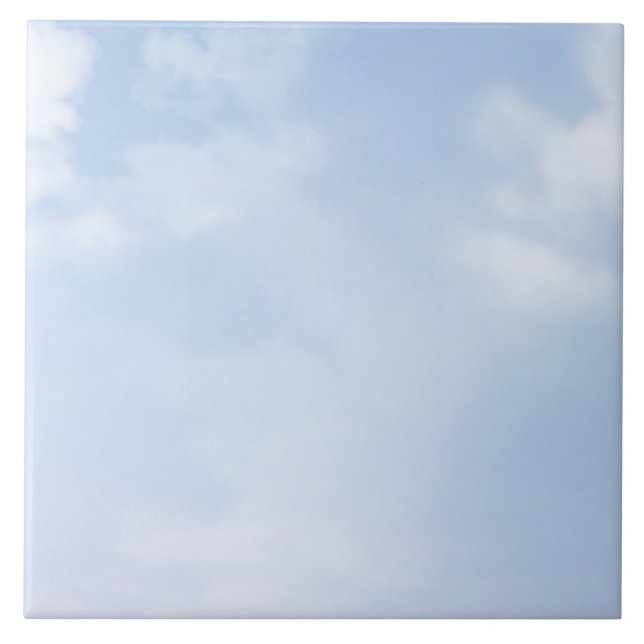 Fluffy clouds on pastel blue sky ceramic tile (Front)