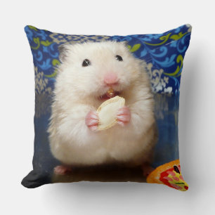 Fluffy syrian hamster Kokolinka eating a seed Cushion