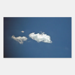 Fluffy white cloud on deep blue sky rectangular sticker
