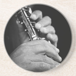 Flute being played in black and white by gypsy coaster