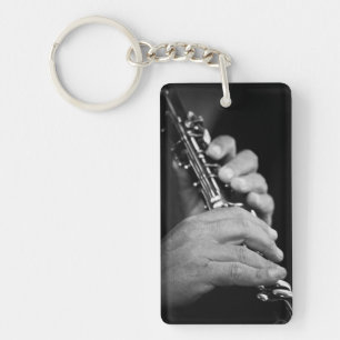 Flute being played in black and white by gypsy key ring