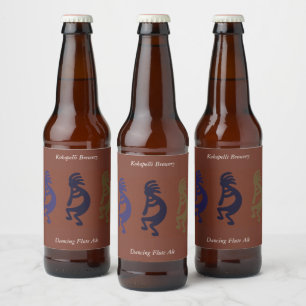 Flute Playing Kokopelli Figures on Rust Red Beer Bottle Label
