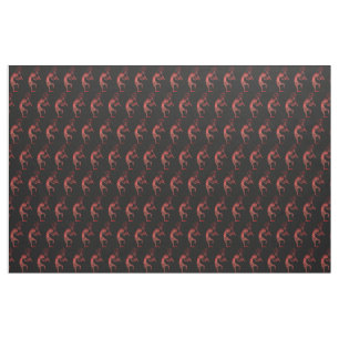flute-playing kokopelli on black fabric