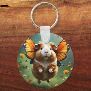 "Flutter Paws: The Guinea Pig Takes Flight" Key Ring