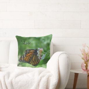 Fluttering Monarch Butterfly on Flower Pillow