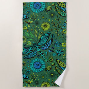 Fly, fly dragonfly on emerald green beach towel