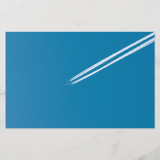 Flying aeroplane on a blue sky background flyer (Front)