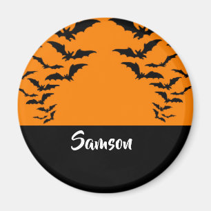 Flying bats on orange magnet