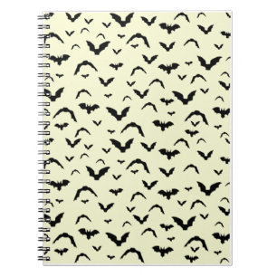 Flying Bats on Yellow Notebook