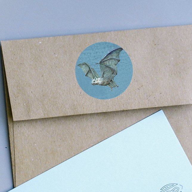 Flying Blue Bat Relief Stickers (Flying blue bat spooky white face on blue round stickers.)