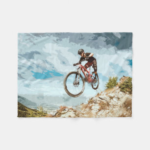 Flying Downhill on a Mountain Bike Fleece Blanket
