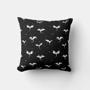 Flying dragons and stars on black background cushion