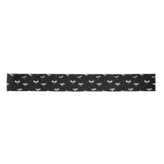 Flying dragons and stars on black background satin ribbon