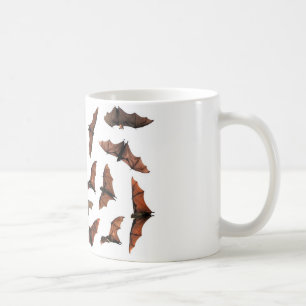 Flying fox fruit bats circling in sky coffee mug