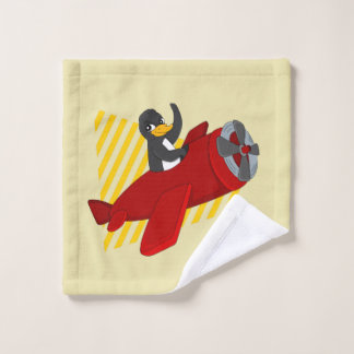 Flying penguin cartoon wash cloth