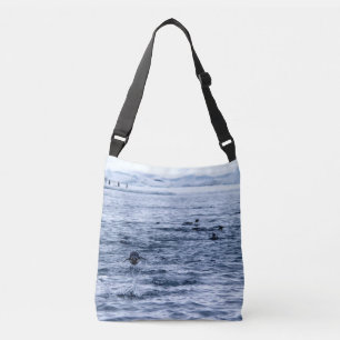 Flying penguin crossbody bag