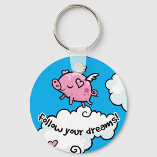 Flying pig dances on clouds key ring