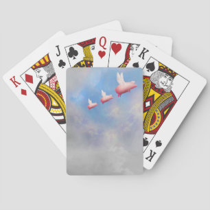 Flying pig mother with her piglets playing cards