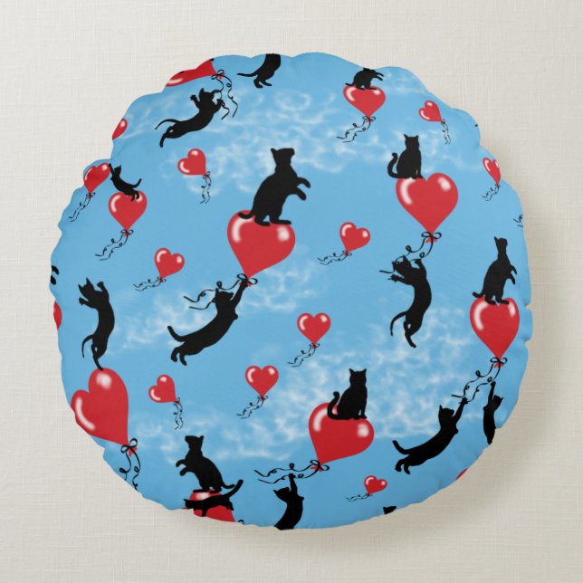 Flying red balloons round cushion (Front)