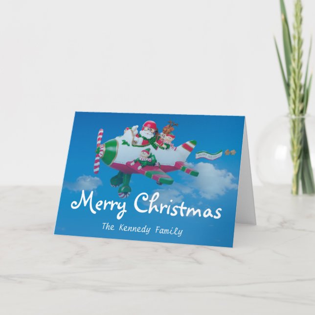 Flying Santa Claus with Elves in Aeroplane Holiday Card (Front)