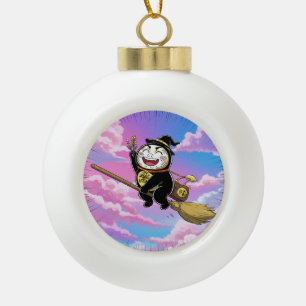 Flying through the sky on a broom ceramic ball christmas ornament