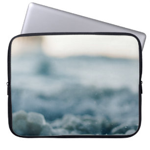 Focus photography of bubbles laptop sleeve