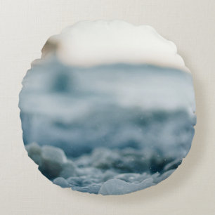 Focus photography of bubbles round cushion