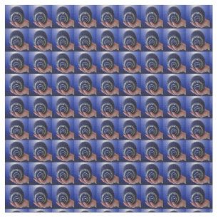 Focused Grip: Hand Holding a Blue Lawn Bowl  Fabric