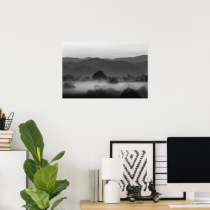 Fog rolling through valley in black and white poster