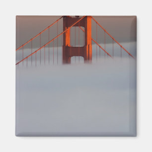 Fog rolls through the San Francisco bay covering 2 Magnet